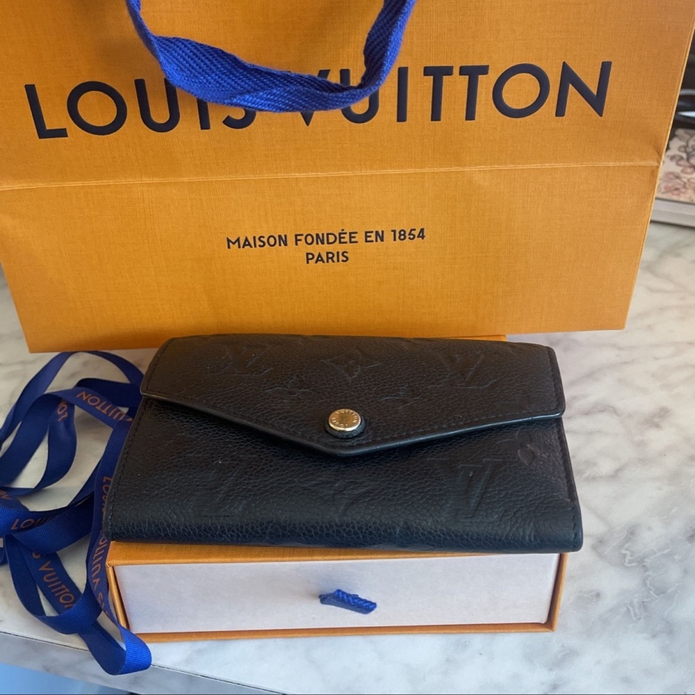 Louis Vuitton Portefeuille Curieze Monogram Leather